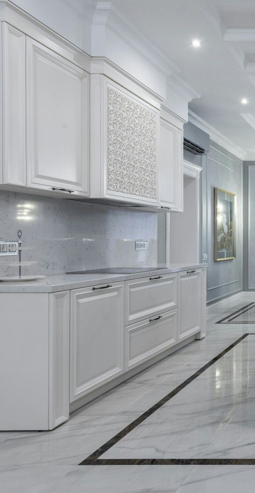 Luxurious marble tiled floor in a high-end Swansea home.